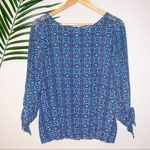 Charming Charlie blue geo design blouse